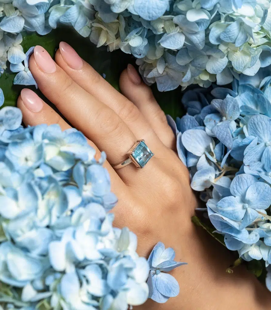 aquamarine ring on hand