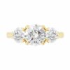 petal setting 3 stone gold engagement ring 1