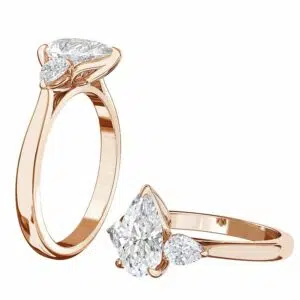 three stone pear shaped ring with petal set rose gold