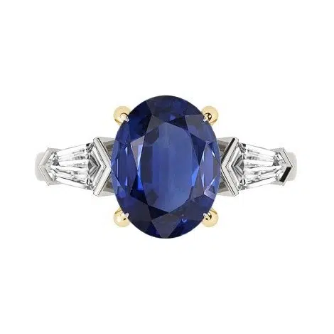 oval sapphire three stone ring with bullet diamond side stones