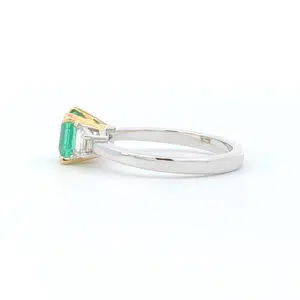 emerald ring with yellow gold detail