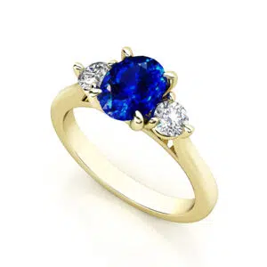 oval sapphire with round diamonds on side 2