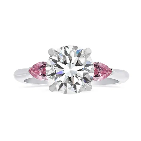 round diamond with pink pear shape sides