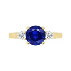 Three Stone Sapphire Ring with Pear Diamond Sides