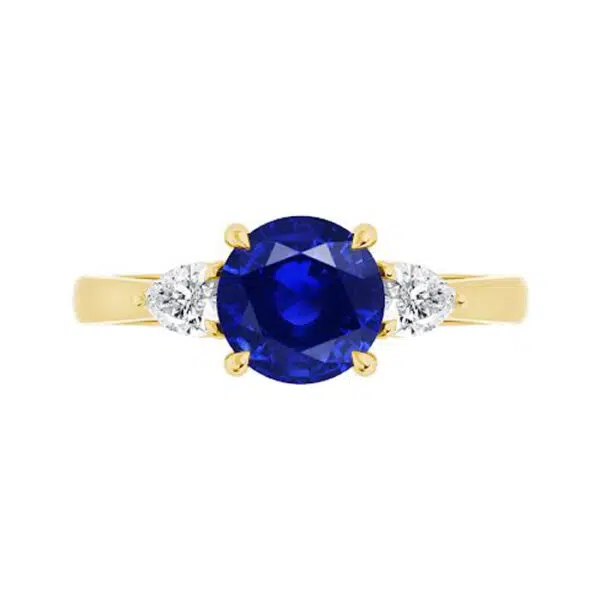 Three Stone Sapphire Ring with Pear Diamond Sides