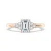 emerald cut with 3 round diamonds