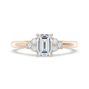 emerald cut with 3 round diamonds