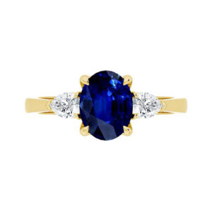 oval blue sapphire with pear diamond sides