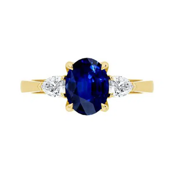 oval blue sapphire with pear diamond sides