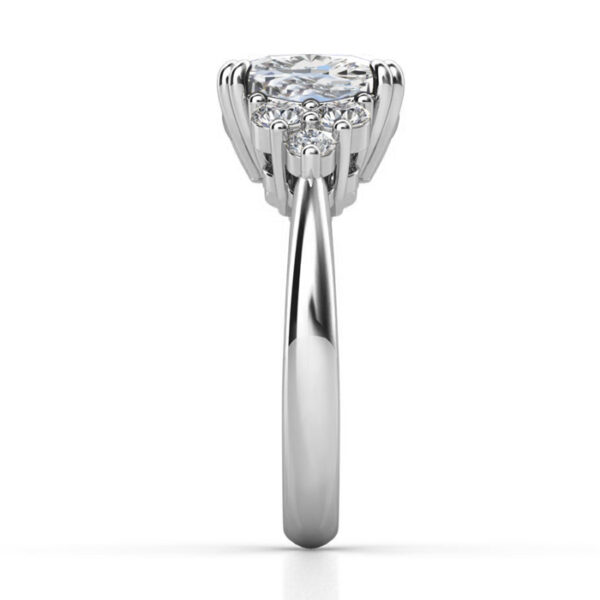 cushion cut diamond ring with three rounds on each side 4