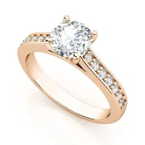 rose gold engagement ring with round diamond and diamond band 1