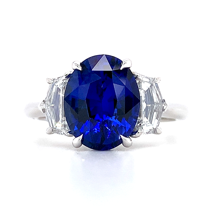 three stone oval sapphire with cadillac diamonds