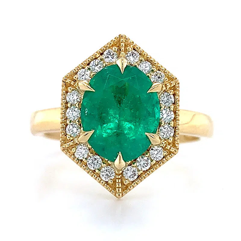 vintage halo emerald gemstone ring