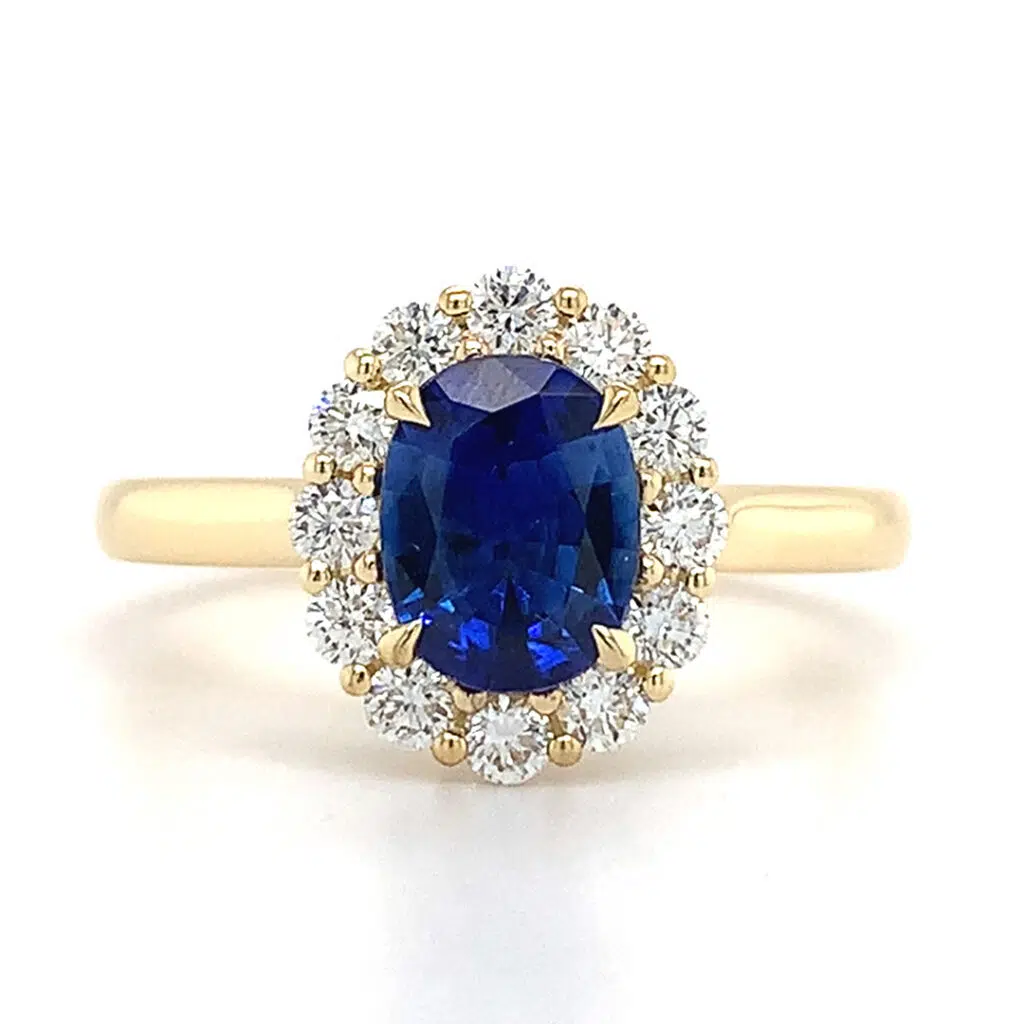 yellow gold blue sapphire halo ring