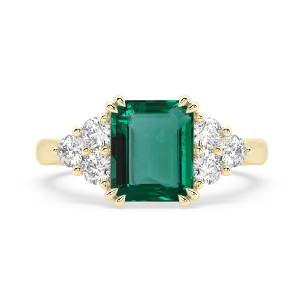 emerald gemstone ring with diamond cluster